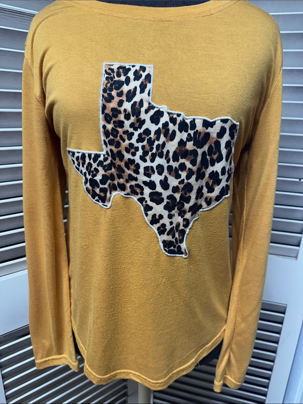 Southern Grace Mustard Long-Sleeve Top with Leopard Texas Appliqué